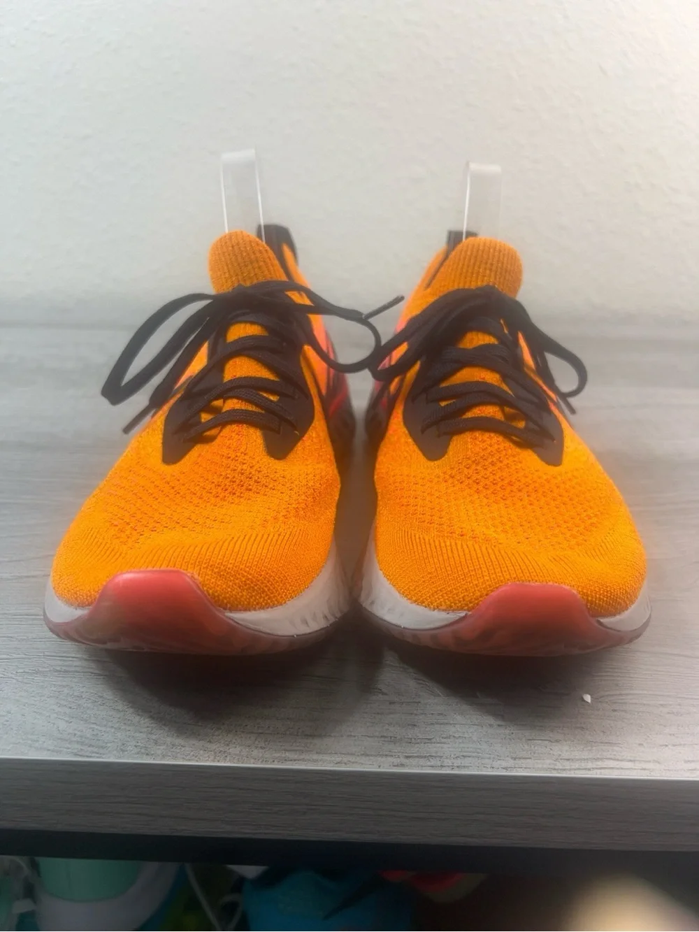 Nike Bright Orange Flyknit Sneakers with Black Accents Women’s Size 10